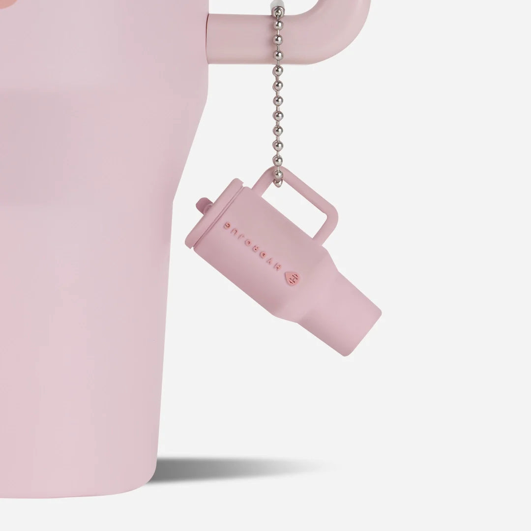 traveler-keychain-n8 Web-TravelerKeychainPhotos-PinkSand2.webp